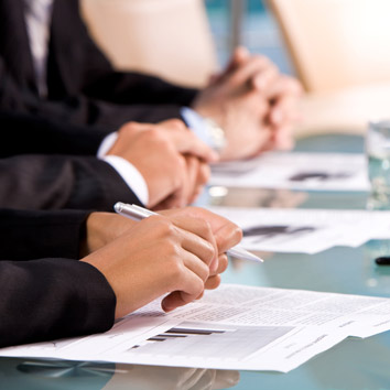 A picture of business stakeholders symbolising the interaction regarding technical writing services